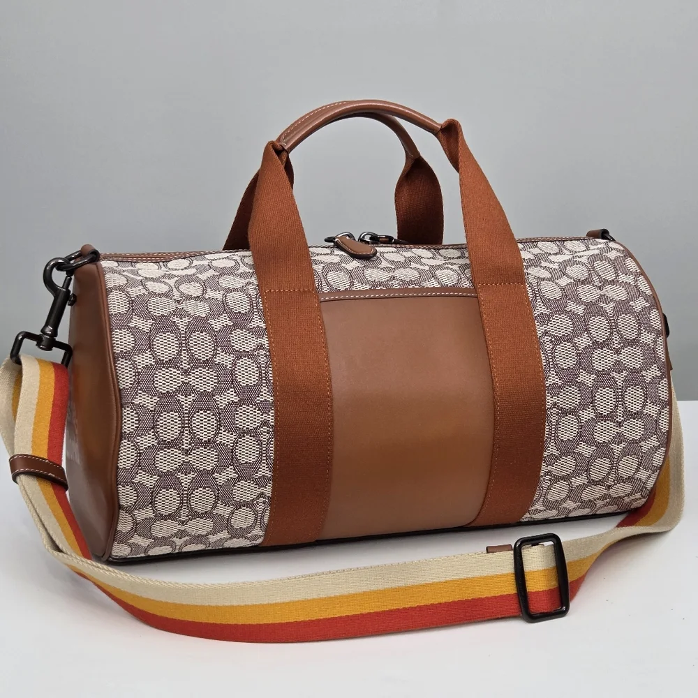 DISNEY X COACH DUFFLE BAG - SIGNATURE TEXTILE JACQUARD MICKEY MOUSE AND FRIENDS